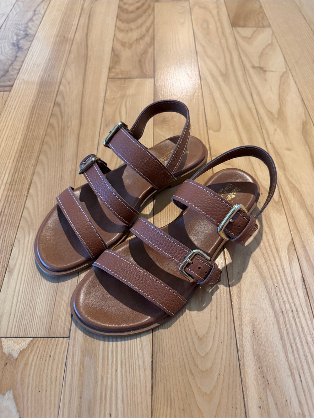 Couch and Four brown sandals